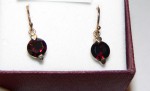 9Ct gold and synthetic Ruby set earrings. Click for more information...