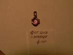 9ct Gold and Amethyst set pendant. Click for more information...