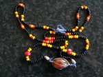 American Indian bead necklace with stone. Click for more information...