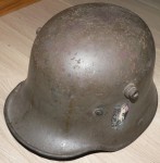 WW1 WW2 German transitional helmet with unusual decal. Click for more information...