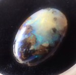 5.5 Ct cut Australian solid boulder Opal. Click for more information...