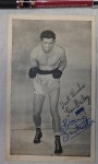Old photo of boxer Ken Bailey 1947 with a dedication. Click for more information...