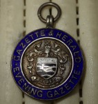 Silver and enamel fob Gazette and Herald Evening Gazette. Click for more information...