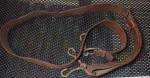 Old leather rifle or MG sling. Click for more information...