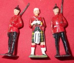 3x Britains lead soldiers one with moving arms. Click for more information...
