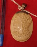 carved Mammoth ivory and silver pendant. Click for more information...