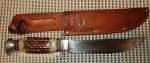 Nice old Mundial bowie style sheath knife with sawback. Click for more information...