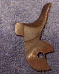 Antique firearm hammer. Click for more information...