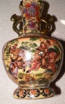 Japanese Satsuma pottery vase heavily decorated. Click for more information...