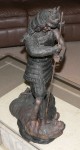 Large old unsigned Bronze of a Samurai with Yari killing a Tiger. Click for more information...