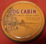 Lovely old log cabin tobacco tin. Click for more information...