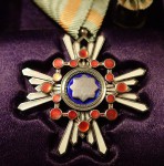 Superb cased Enamelled Japanese order of the sacred treasure 5th class. Click for more information...
