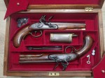 circa 1830 Cased pair of John Harvey full stocked flintlock officers pistols. Click for more information...