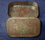 an131 small vesta size tin used to post cake back in the day. Click for more information...