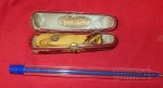 Fancy cased antique cigarette holder with silver inlay. Click for more information...