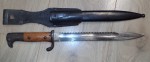 German K98 sawback bayonet with frog 1913 dated. Click for more information...